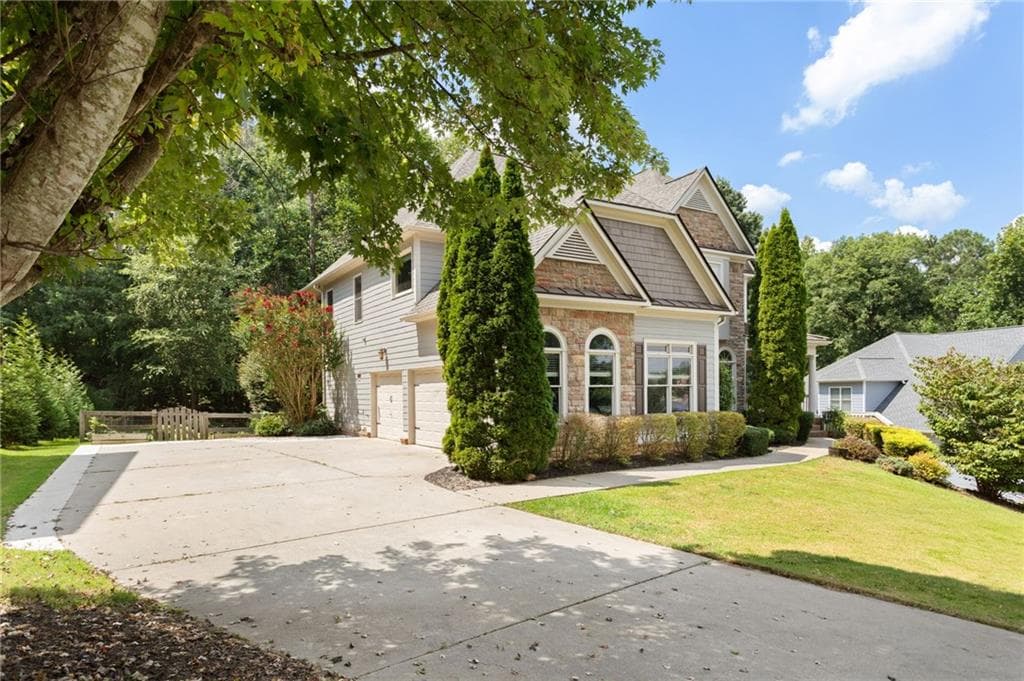 6 bedroom, 5 bathroom, 5,600 sq ft single family residence for sale at 320 Double Branches Lane, Dallas, GA 30132 — photo 2