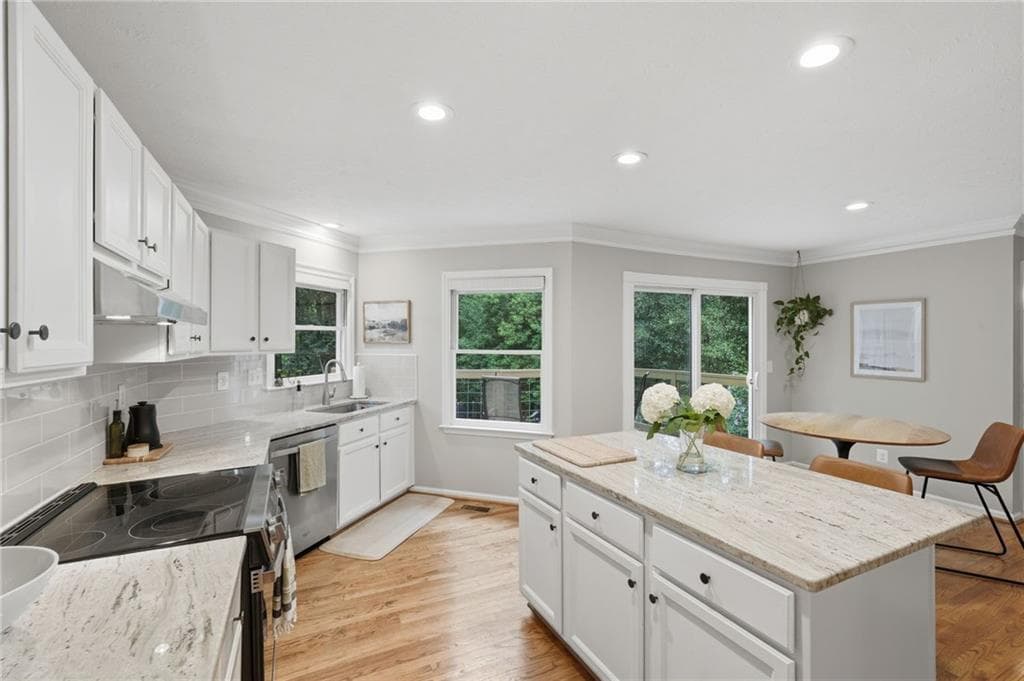 4 bedroom, 4 bathroom, 3,042 sq ft single family residence for sale at 643 Laufin Court, Lawrenceville, GA 30043 — photo 6
