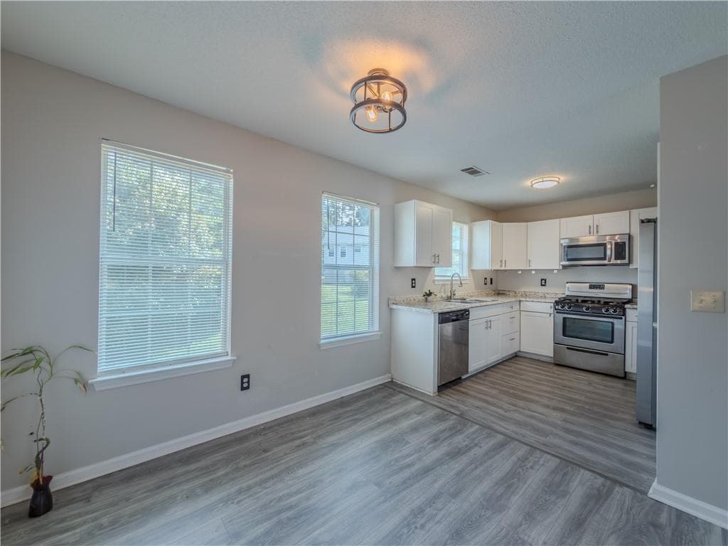 3 bedroom, 2 bathroom, 1,680 sq ft single family residence for sale at 6196 Idlewood Circle, Lithonia, GA 30038 — photo 7