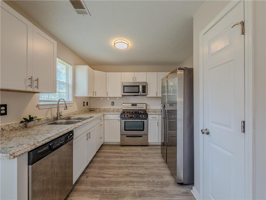 3 bedroom, 2 bathroom, 1,680 sq ft single family residence for sale at 6196 Idlewood Circle, Lithonia, GA 30038 — photo 8