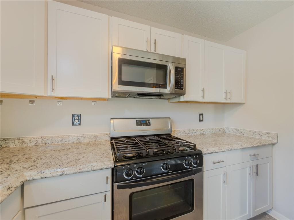 3 bedroom, 2 bathroom, 1,680 sq ft single family residence for sale at 6196 Idlewood Circle, Lithonia, GA 30038 — photo 10