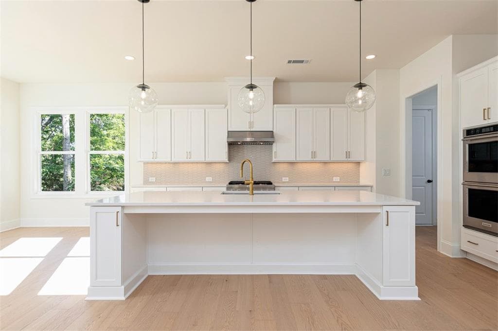 5 bedroom, 6 bathroom, 3,674 sq ft single family residence for sale at 3485 Austin Michael Lane, Cumming, GA 30028 — photo 5