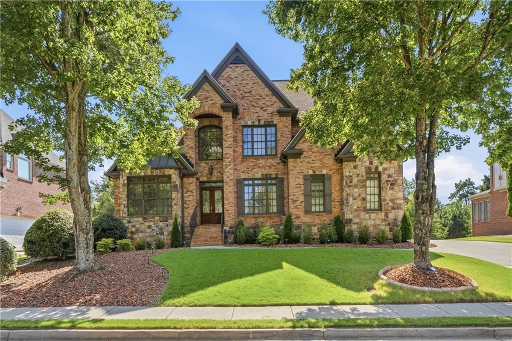 5 bedroom, 6 bathroom, 5,711 sq ft single family residence for sale at 2711 Trailing Ivy Way, Buford, GA 30519 — photo 3