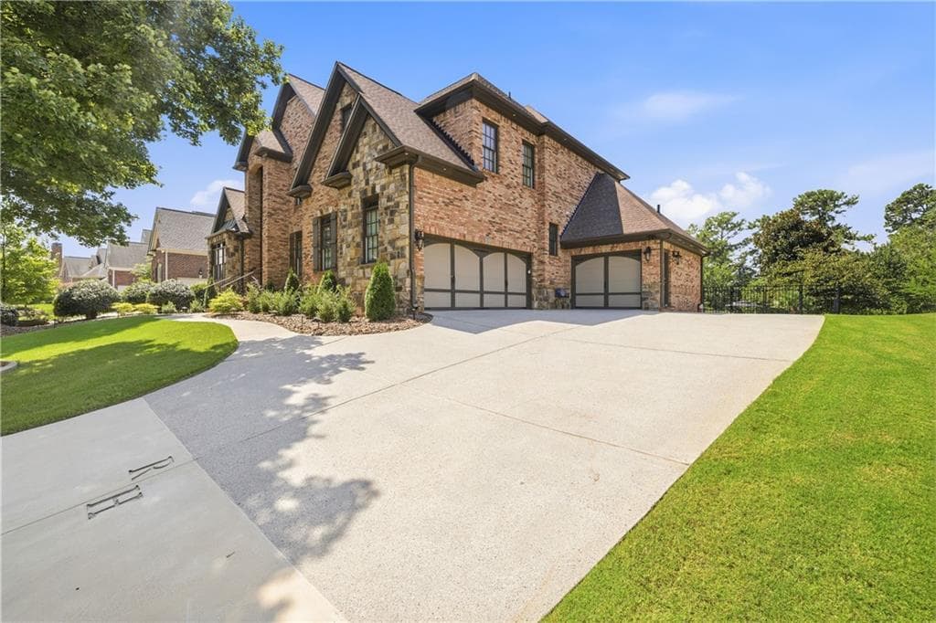 5 bedroom, 6 bathroom, 5,711 sq ft single family residence for sale at 2711 Trailing Ivy Way, Buford, GA 30519 — photo 7