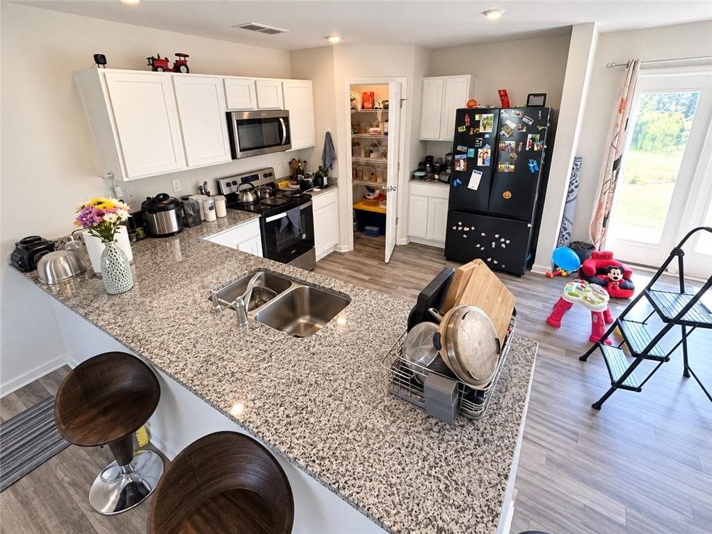 4 bedroom, 3 bathroom, 1,696 sq ft single family residence for sale at 51 Oxford Lane, Kingston, GA 30145 — photo 9