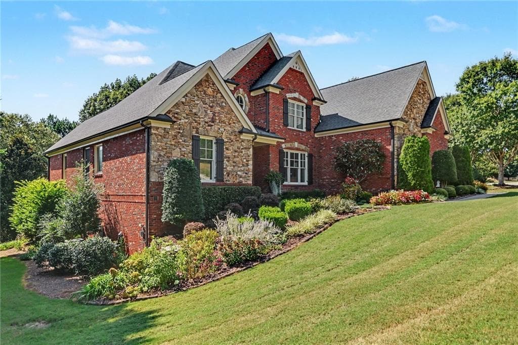 4 bedroom, 6 bathroom, 5,700 sq ft single family residence for sale at 4638 Cardinal Ridge Way, Flowery Branch, GA 30542 — photo 2