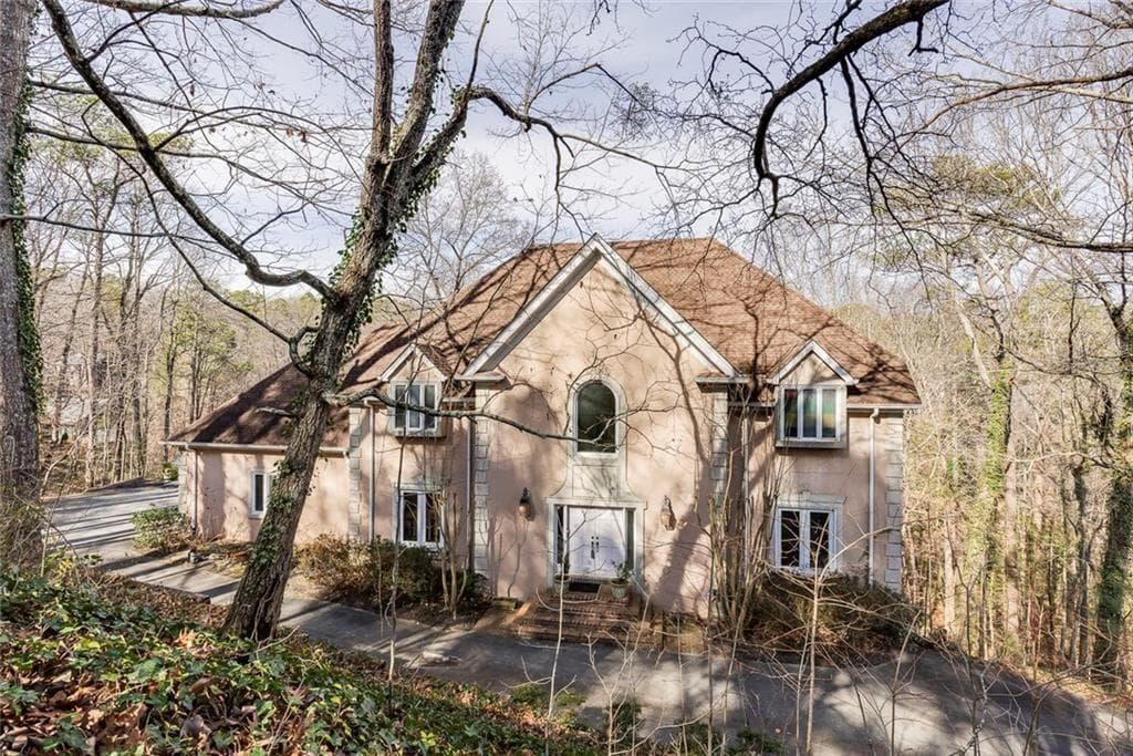 5 bedroom, 6 bathroom, 6,800 sq ft single family residence for sale at 5105 Jett Forest Trail, Atlanta, GA 30327 — photo 1 of 60