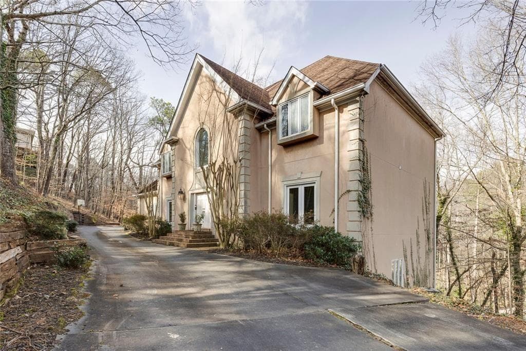 5 bedroom, 6 bathroom, 6,800 sq ft single family residence for sale at 5105 Jett Forest Trail, Atlanta, GA 30327 — photo 2