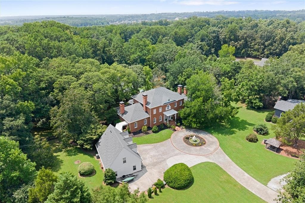 6 bedroom, 6 bathroom, 11,869 sq ft single family residence for sale at 1650 Sever Road, Lawrenceville, GA 30043 — photo 4