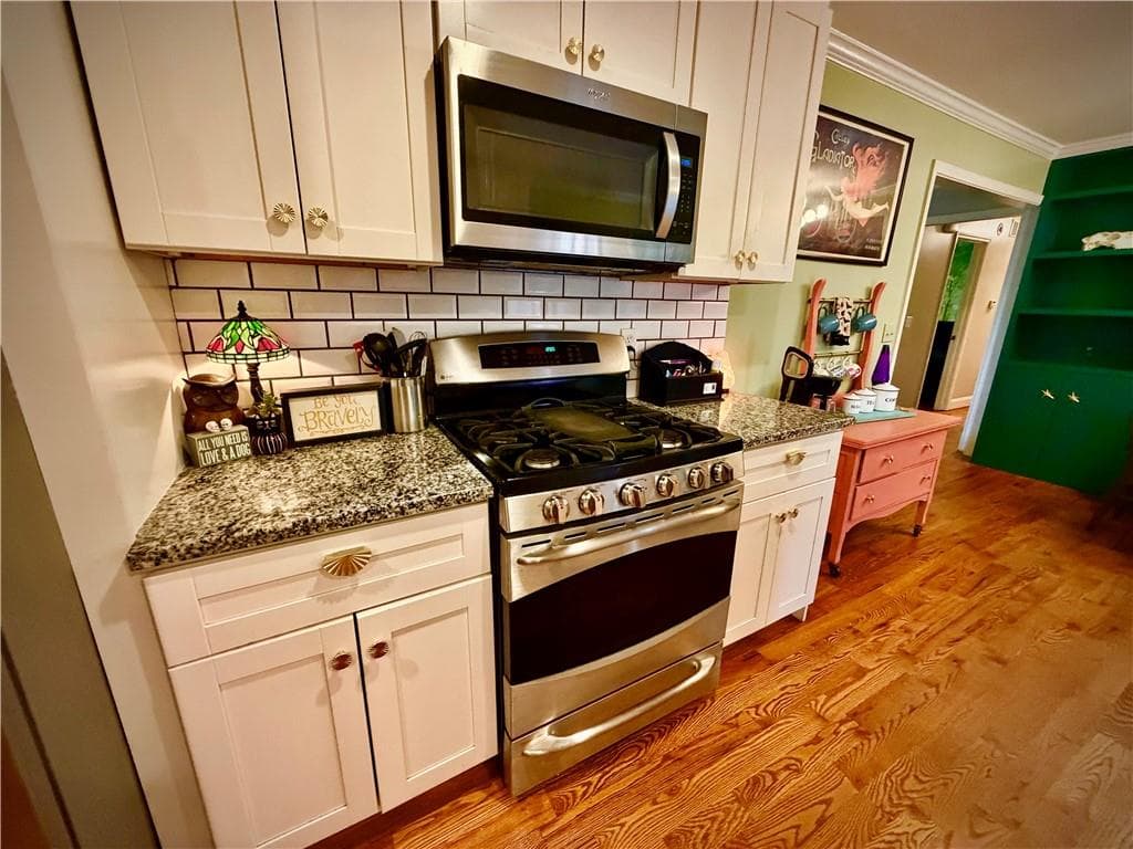 3 bedroom, 2 bathroom, 1,671 sq ft single family residence for sale at 1395 Allatoona Court, Kennesaw, GA 30152 — photo 7