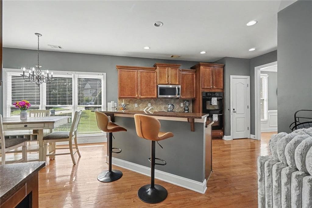5 bedroom, 4 bathroom, 3,600 sq ft single family residence for sale at 825 Grand Ivey Place, Dacula, GA 30019 — photo 7