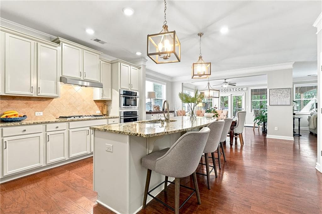 5 bedroom, 4 bathroom, 4,575 sq ft single family residence for sale at 412 Hathaway Avenue, Woodstock, GA 30188 — photo 7