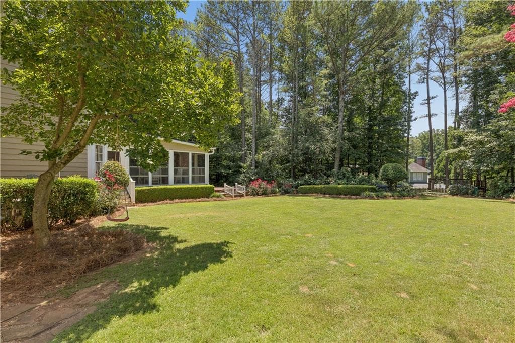4 bedroom, 3 bathroom, 3,624 sq ft single family residence for sale at 4770 Hamptons Drive, Alpharetta, GA 30004 — photo 4
