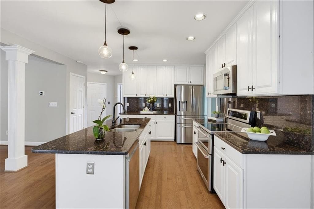 5 bedroom, 4 bathroom, 3,802 sq ft single family residence for sale at 1014 Legacy Walk, Woodstock, GA 30189 — photo 10