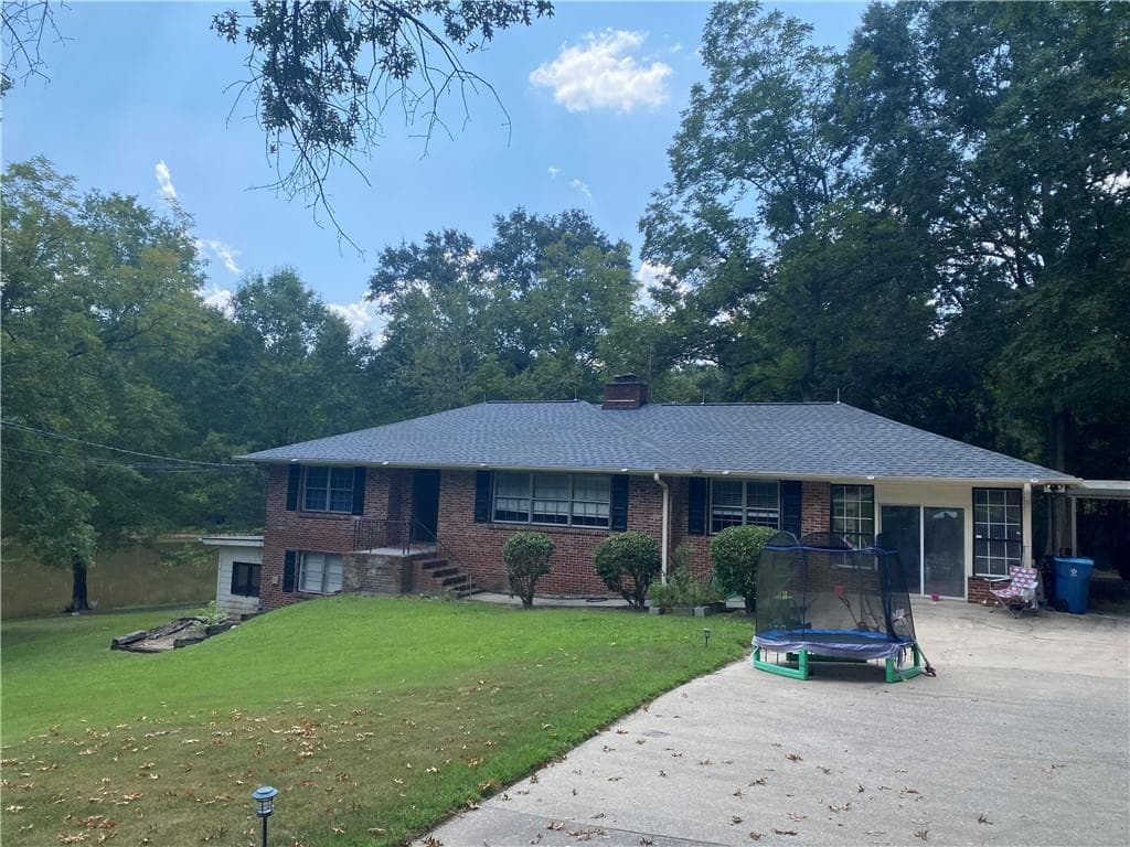 4 bedroom, 3 bathroom, 2,713 sq ft single family residence for sale at 1100 Billy Mcgee Road, Lawrenceville, GA 30045 — photo 1 of 35