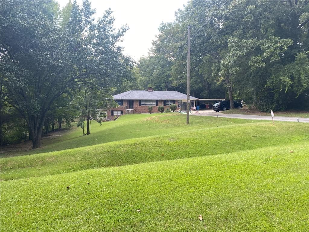 4 bedroom, 3 bathroom, 2,713 sq ft single family residence for sale at 1100 Billy Mcgee Road, Lawrenceville, GA 30045 — photo 2