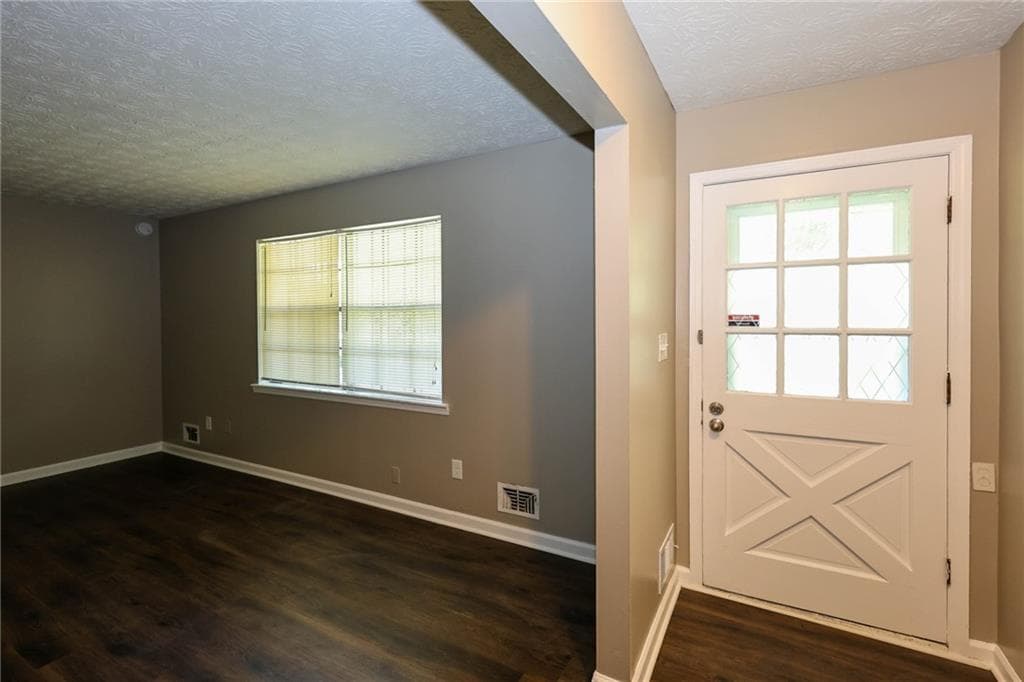 3 bedroom, 2 bathroom, 2,480 sq ft single family residence for sale at 7362 Penland Drive, Riverdale, GA 30296 — photo 2
