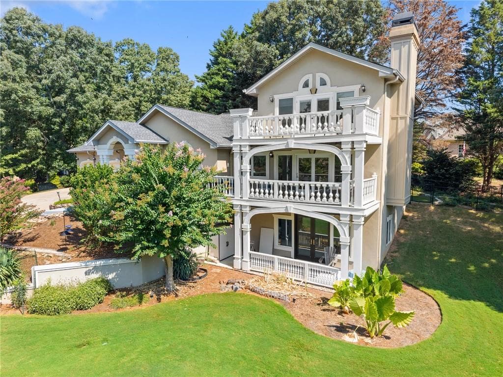 4 bedroom, 3 bathroom, 3,528 sq ft single family residence for sale at 9220 Mainsail Drive, Gainesville, GA 30506 — photo 1 of 49