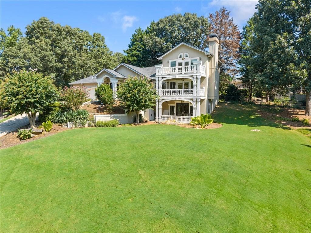 4 bedroom, 3 bathroom, 3,528 sq ft single family residence for sale at 9220 Mainsail Drive, Gainesville, GA 30506 — photo 3