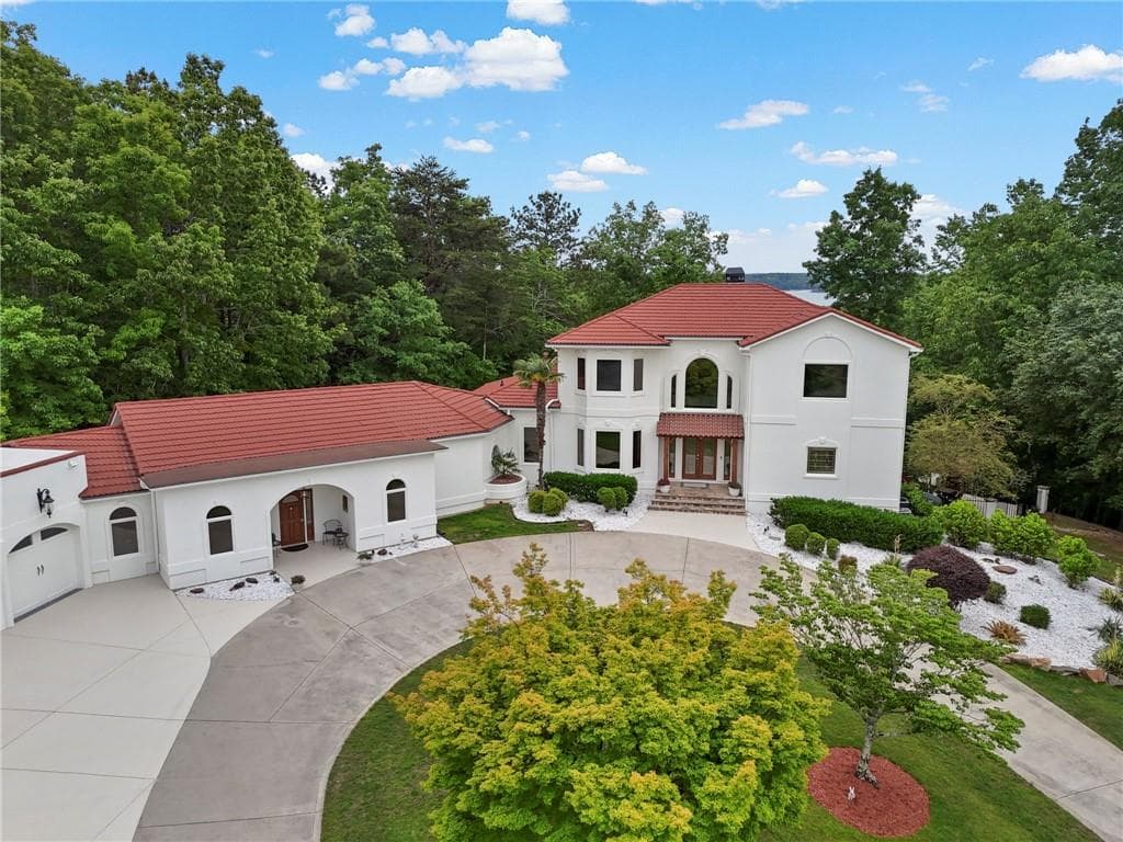 6 bedroom, 7 bathroom, 7,363 sq ft single family residence for sale at 7430 Shadburn Ferry Road, Cumming, GA 30041 — photo 5