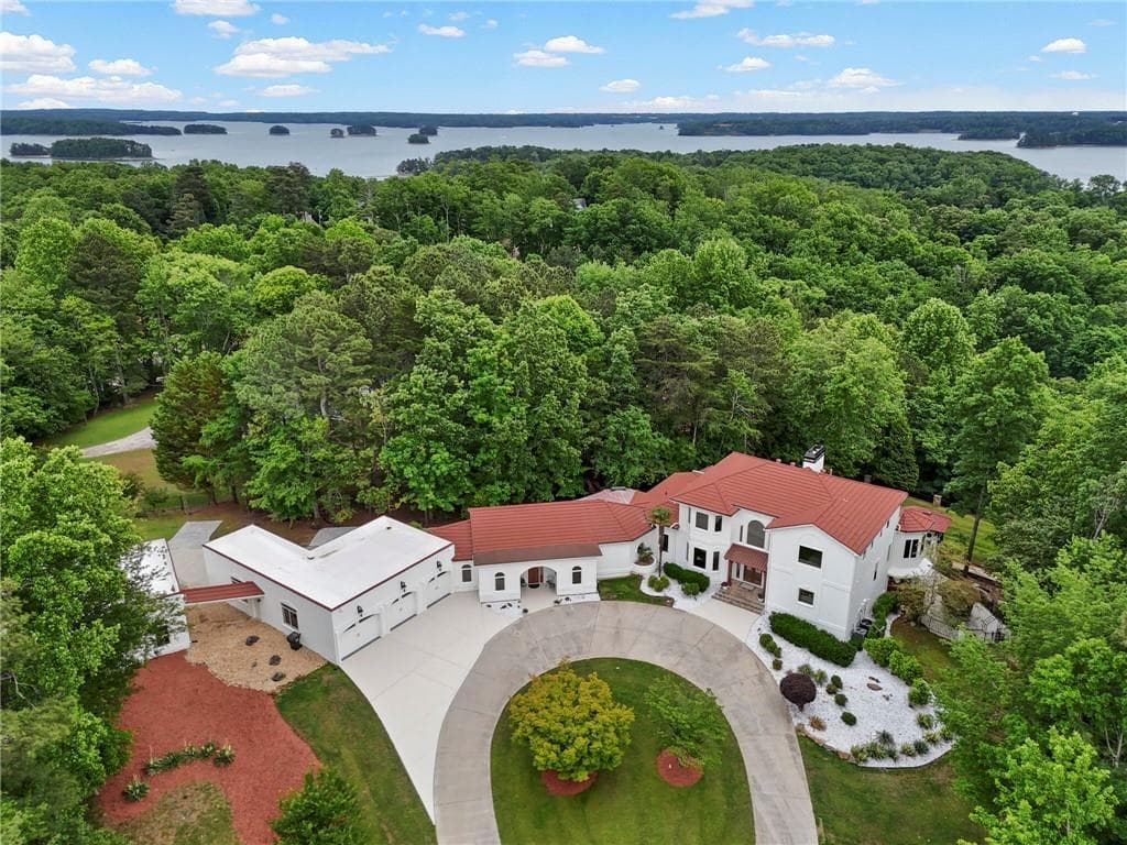 6 bedroom, 7 bathroom, 7,363 sq ft single family residence for sale at 7430 Shadburn Ferry Road, Cumming, GA 30041 — photo 2