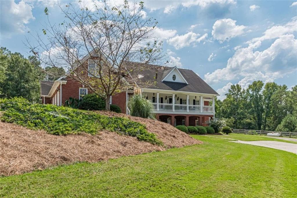 6 bedroom, 5 bathroom, 6,050 sq ft single family residence for sale at 5335 N Helton Road, Winston, GA 30187 — photo 3