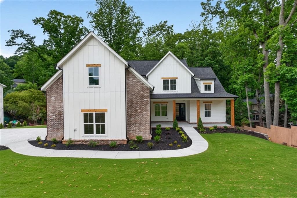 4 bedroom, 4 bathroom, 3,018 sq ft single family residence for sale at 4299 Forest Place, Cumming, GA 30041 — photo 1 of 55