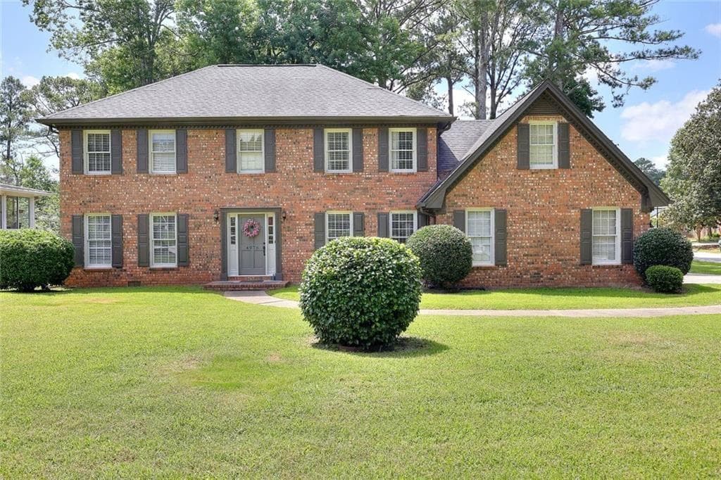 4 bedroom, 3 bathroom, 3,141 sq ft single family residence for sale at 4976 Mystere Circle, Lilburn, GA 30047 — photo 2