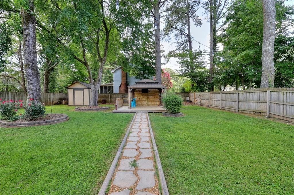 4 bedroom, 3 bathroom, 3,141 sq ft single family residence for sale at 4976 Mystere Circle, Lilburn, GA 30047 — photo 6