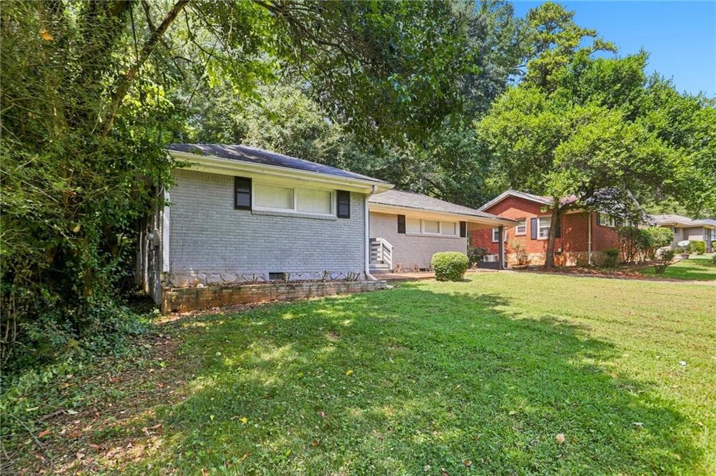 3 bedroom, 2 bathroom, 1,138 sq ft single family residence for sale at 1145 Canal Street, Decatur, GA 30032 — photo 2