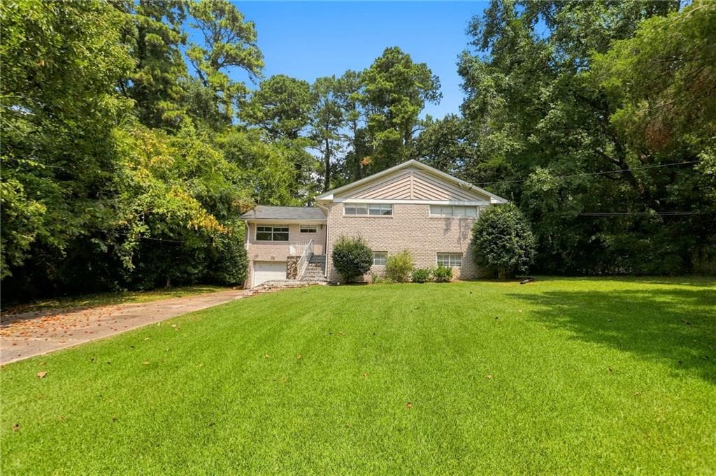 5 bedroom, 3 bathroom, 1,750 sq ft single family residence for sale at 3456 Spring Circle, Decatur, GA 30032 — photo 2