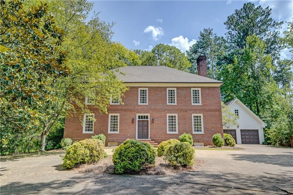 4 bedroom, 4 bathroom, 3,584 sq ft single family residence for sale at 1740 Highgrove Club Drive, Milton, GA 30004 — photo 2