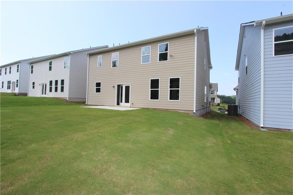4 bedroom, 3 bathroom, 2,428 sq ft single family residence for sale at 7376 ROCKLIN LANE, Flowery Branch, GA 30542 — photo 4