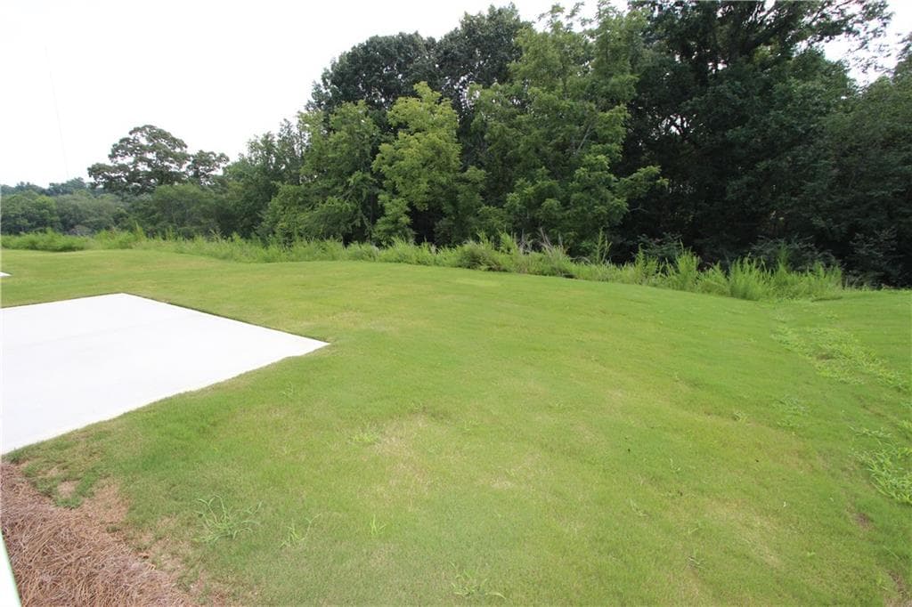 4 bedroom, 3 bathroom, 2,428 sq ft single family residence for sale at 7376 ROCKLIN LANE, Flowery Branch, GA 30542 — photo 5