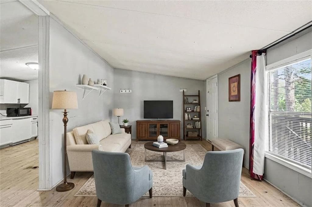 3 bedroom, 2 bathroom, 1,150 sq ft single family residence for sale at 915 Steele Drive, Hampton, GA 30228 — photo 4