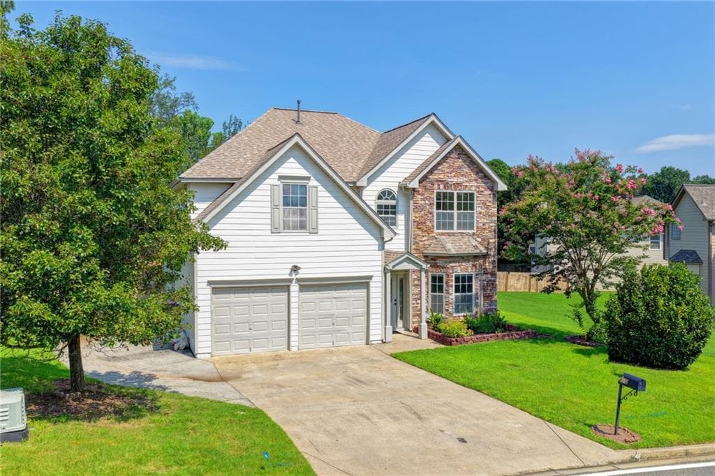4 bedroom, 3 bathroom, 2,896 sq ft single family residence for sale at 220 Nichols Drive, Suwanee, GA 30024 — photo 3