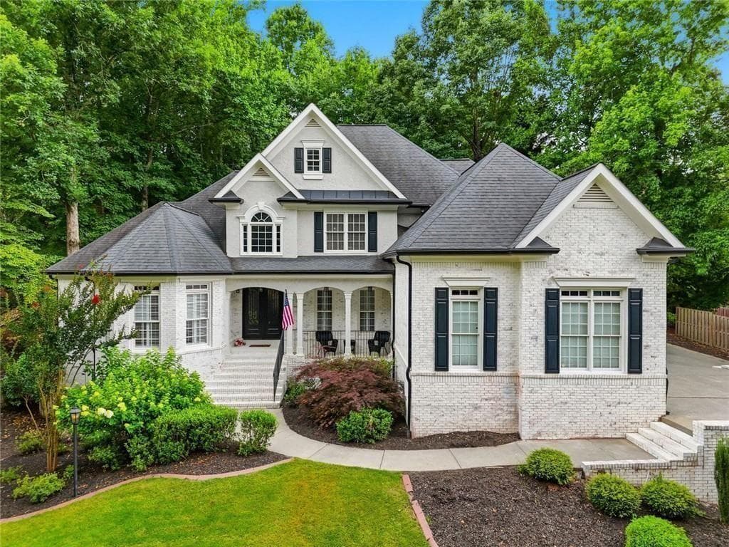 5 bedroom, 5 bathroom, 6,752 sq ft single family residence for sale at 5025 Towne Lake Hills, Woodstock, GA 30189 — photo 2