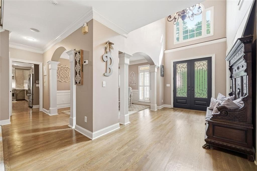 5 bedroom, 5 bathroom, 6,752 sq ft single family residence for sale at 5025 Towne Lake Hills, Woodstock, GA 30189 — photo 7