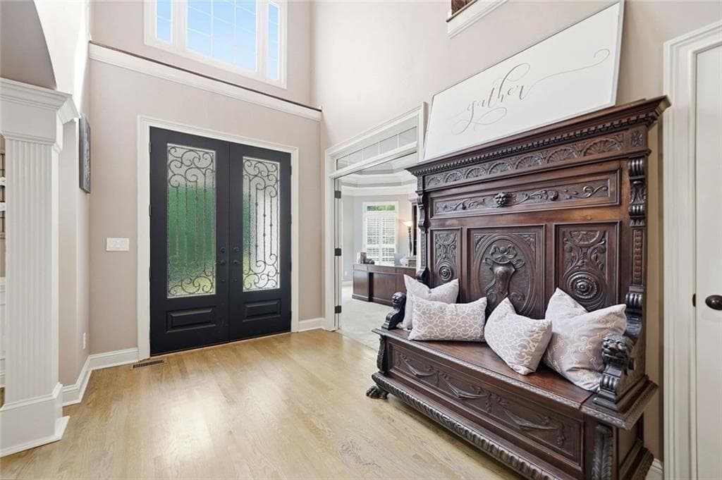 5 bedroom, 5 bathroom, 6,752 sq ft single family residence for sale at 5025 Towne Lake Hills, Woodstock, GA 30189 — photo 9