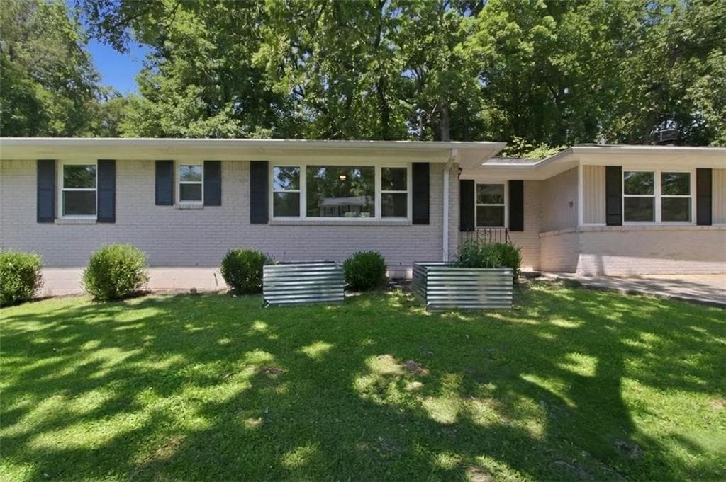 3 bedroom, 2 bathroom, 1,381 sq ft single family residence for sale at 1763 Meadowglades Drive, Decatur, GA 30035