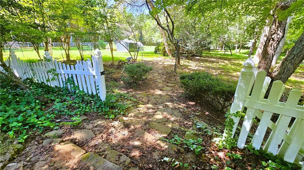 5 bedroom, 3 bathroom, 2,854 sq ft single family residence for sale at 528 Lazy River Lane, Woodstock, GA 30188 — photo 2