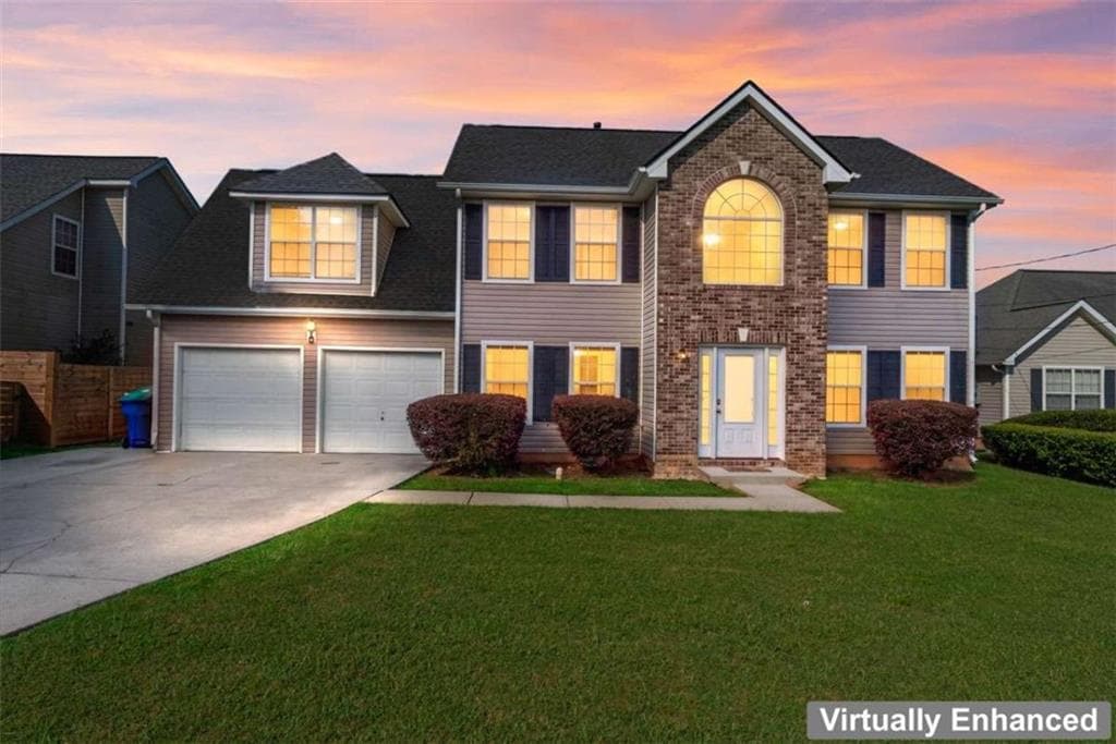 4 bedroom, 3 bathroom, 1,990 sq ft single family residence for sale at 6062 Lamp Post Place, Atlanta, GA 30349 — photo 2