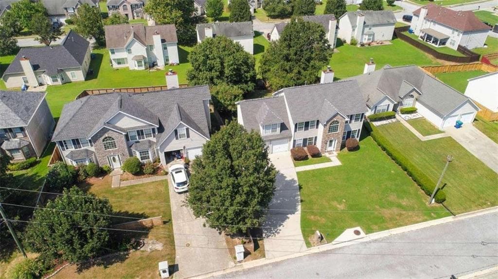 4 bedroom, 3 bathroom, 1,990 sq ft single family residence for sale at 6062 Lamp Post Place, Atlanta, GA 30349 — photo 6