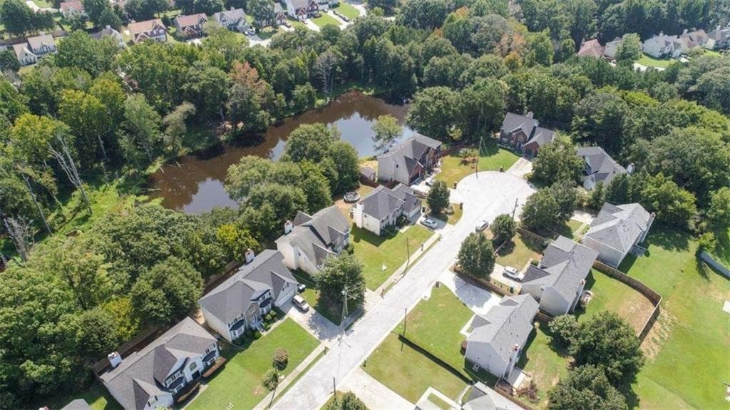 4 bedroom, 3 bathroom, 1,990 sq ft single family residence for sale at 6062 Lamp Post Place, Atlanta, GA 30349 — photo 7