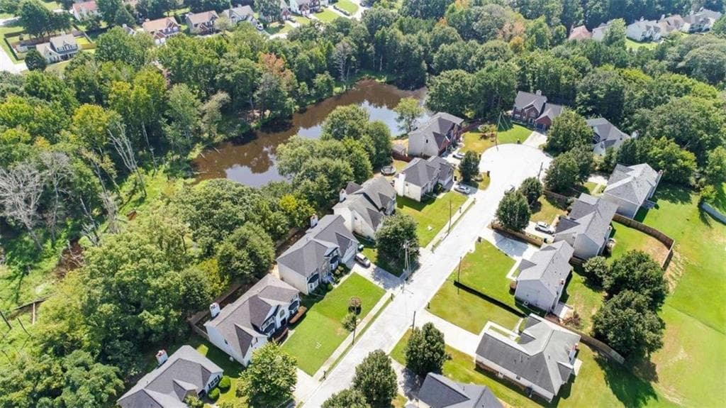 4 bedroom, 3 bathroom, 1,990 sq ft single family residence for sale at 6062 Lamp Post Place, Atlanta, GA 30349 — photo 8