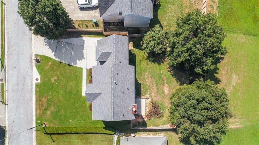 4 bedroom, 3 bathroom, 1,990 sq ft single family residence for sale at 6062 Lamp Post Place, Atlanta, GA 30349 — photo 9