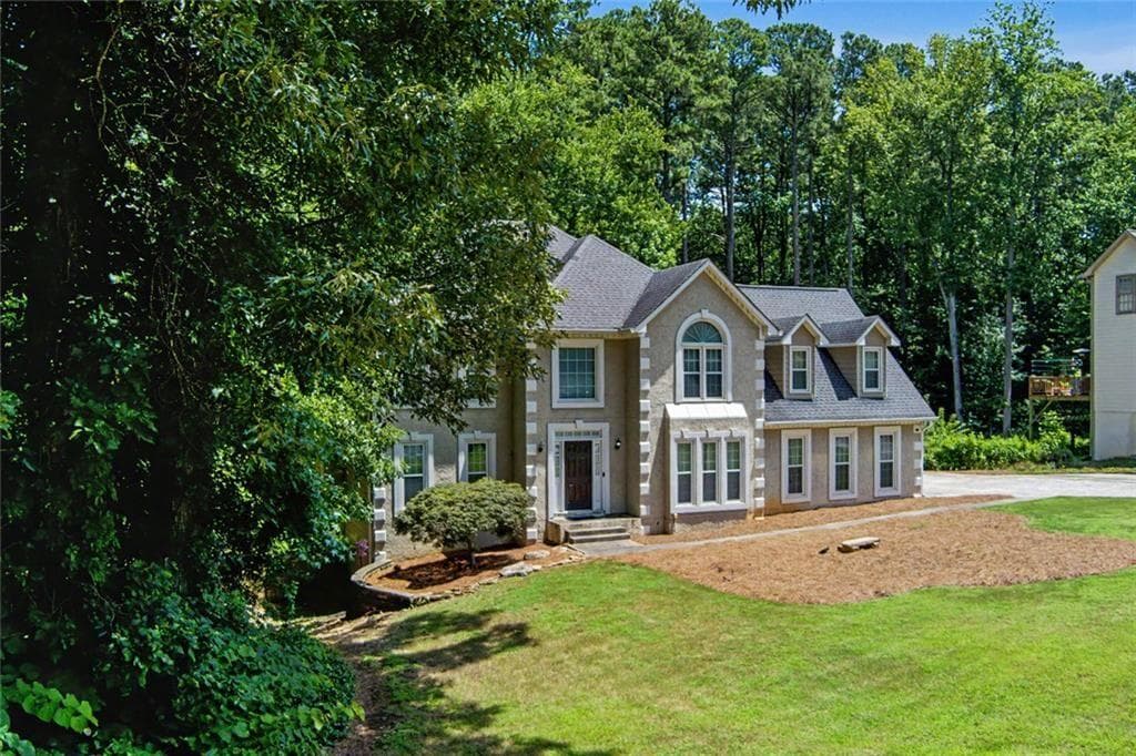 5 bedroom, 4 bathroom, 4,189 sq ft single family residence for sale at 6028 Wyndham Woods Drive, Powder Springs, GA 30127