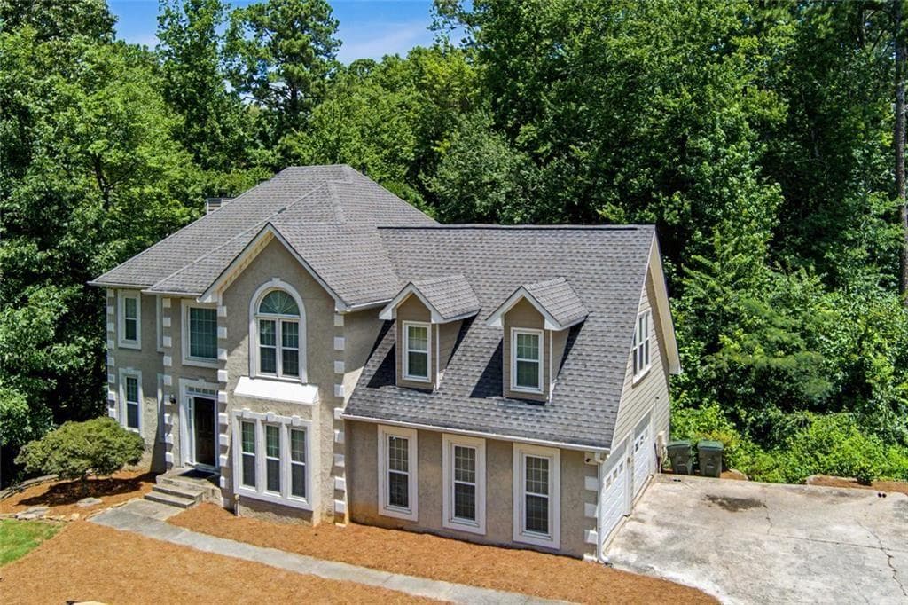 5 bedroom, 4 bathroom, 4,189 sq ft single family residence for sale at 6028 Wyndham Woods Drive, Powder Springs, GA 30127 — photo 4