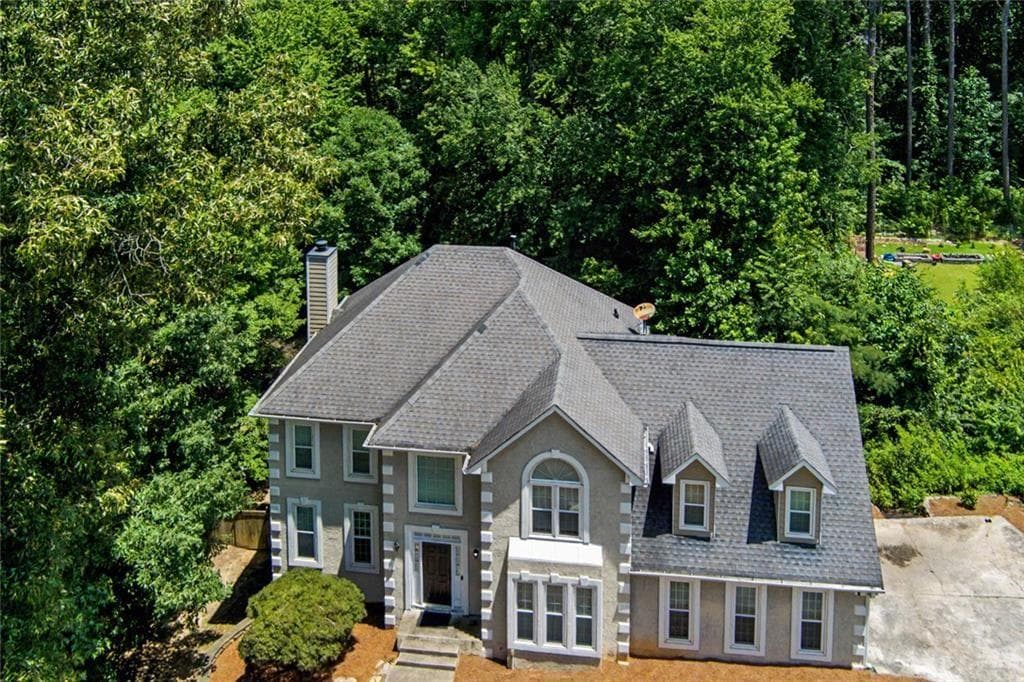 5 bedroom, 4 bathroom, 4,189 sq ft single family residence for sale at 6028 Wyndham Woods Drive, Powder Springs, GA 30127 — photo 5