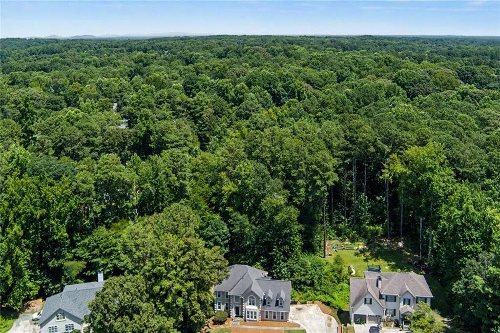 5 bedroom, 4 bathroom, 4,189 sq ft single family residence for sale at 6028 Wyndham Woods Drive, Powder Springs, GA 30127 — photo 6